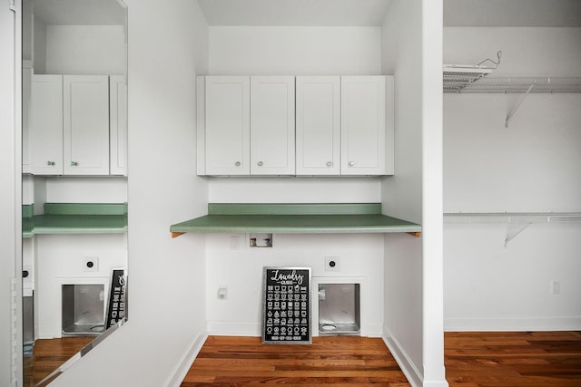 washroom with dark wood-type flooring, washer hookup, and hookup for an electric dryer