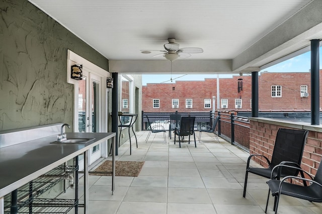 view of patio / terrace with sink and ceiling fan