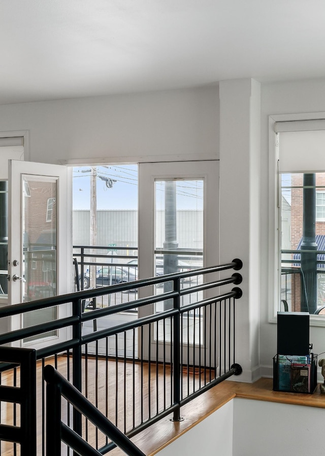 hall featuring hardwood / wood-style flooring and plenty of natural light