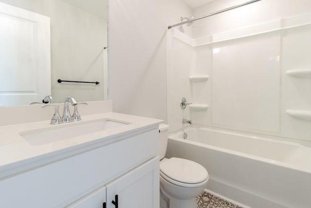 full bathroom with vanity, washtub / shower combination, and toilet