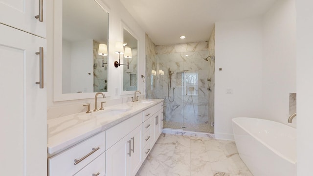 bathroom with shower with separate bathtub and vanity