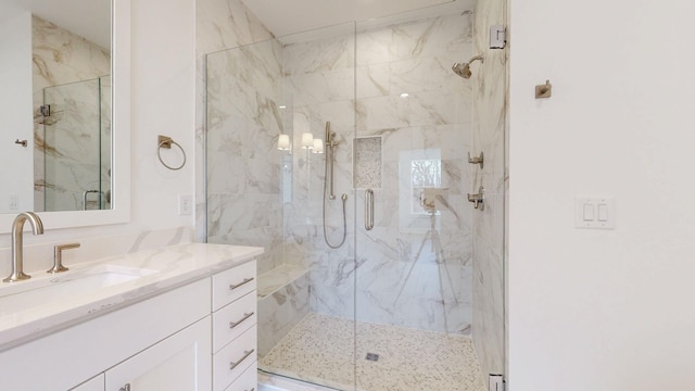 bathroom with vanity and an enclosed shower