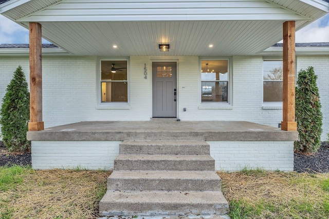 entrance to property featuring a porch