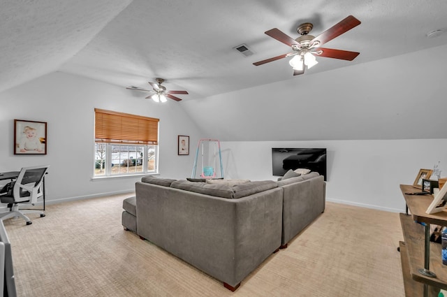 living room featuring baseboards, visible vents, vaulted ceiling, and light colored carpet