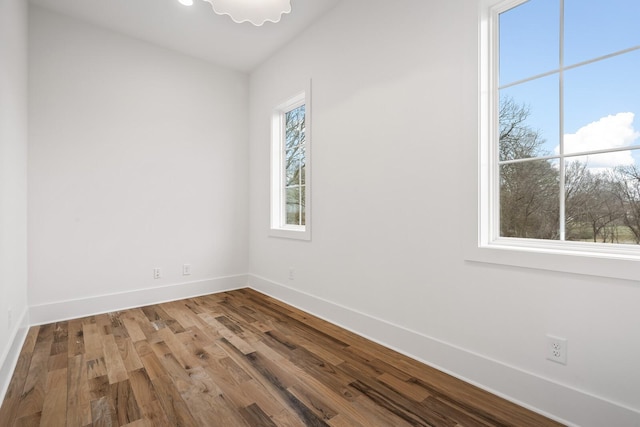 empty room featuring hardwood / wood-style flooring