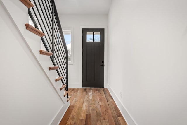 entrance foyer with light hardwood / wood-style flooring