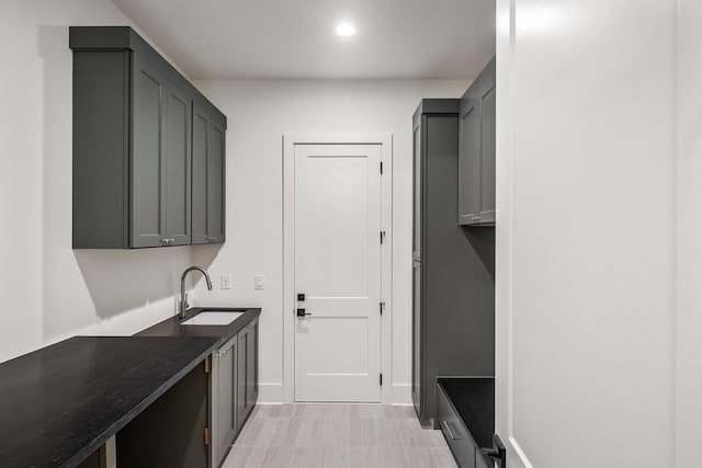 laundry room featuring sink