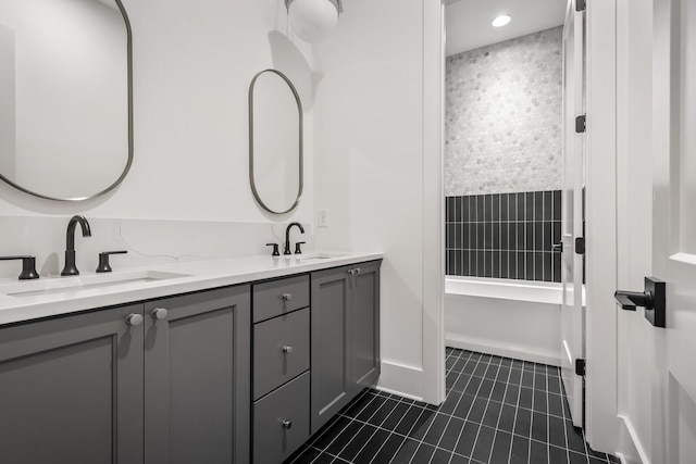 bathroom featuring tile patterned floors and vanity