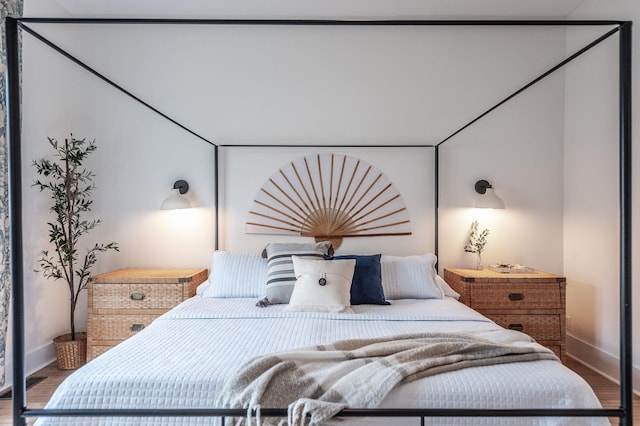 bedroom featuring hardwood / wood-style floors