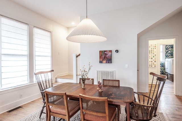 dining room with light hardwood / wood-style floors