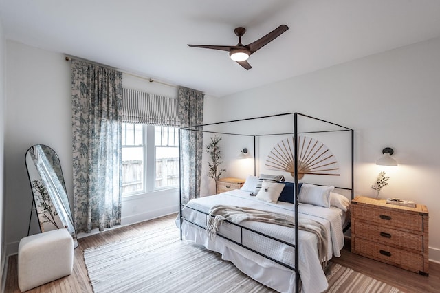 bedroom featuring ceiling fan and wood-type flooring