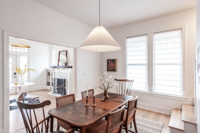 dining area with light hardwood / wood-style floors