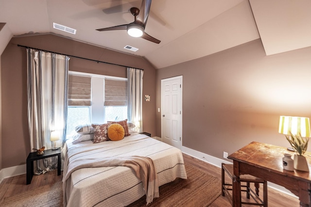 bedroom with lofted ceiling, wood-type flooring, and ceiling fan