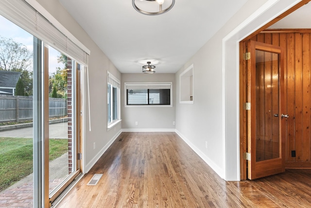 interior space with hardwood / wood-style floors