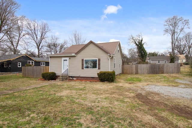 view of front of home with a front yard