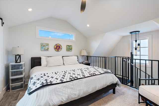 bedroom featuring lofted ceiling and ceiling fan