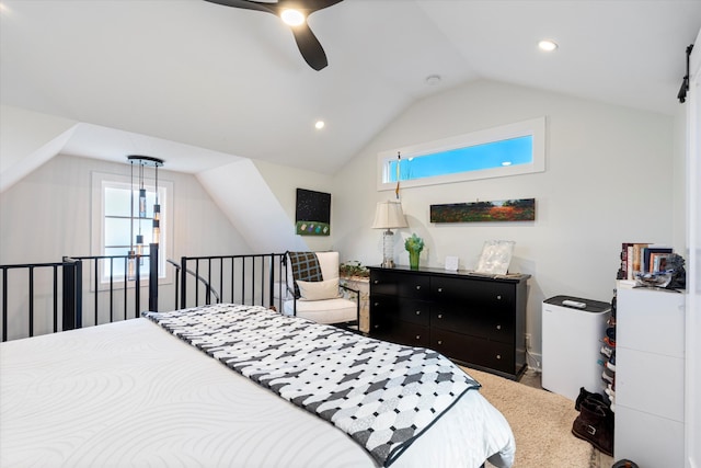 bedroom with multiple windows, lofted ceiling, carpet, and ceiling fan