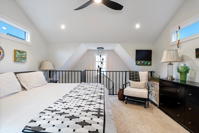 carpeted bedroom with lofted ceiling and ceiling fan