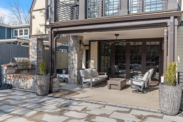 view of patio featuring area for grilling, grilling area, and french doors