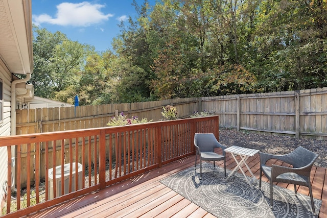 wooden terrace featuring central AC