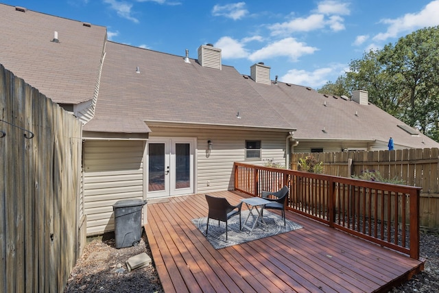 wooden deck featuring french doors