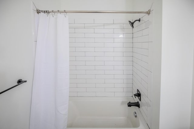 bathroom featuring shower / bath combination with curtain