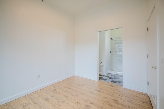 unfurnished room featuring light hardwood / wood-style floors