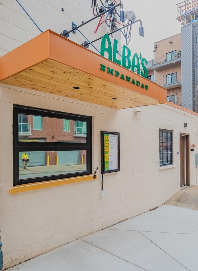 exterior space featuring concrete block siding