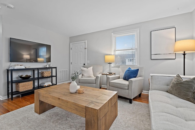 living room featuring light wood-type flooring