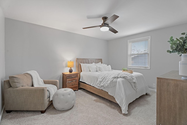 bedroom featuring ceiling fan and light colored carpet