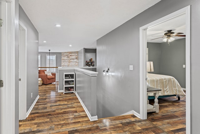 hall featuring dark wood-type flooring