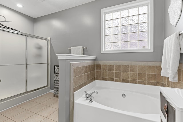 bathroom with tile patterned flooring and plus walk in shower