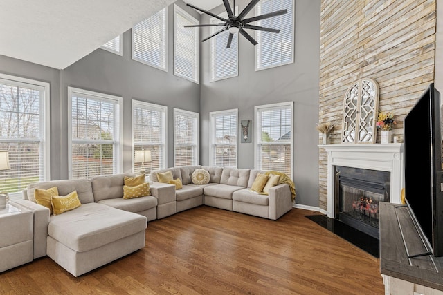 sunroom featuring ceiling fan