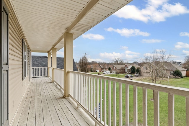 deck featuring a lawn