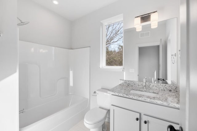 full bathroom with vanity,  shower combination, and toilet