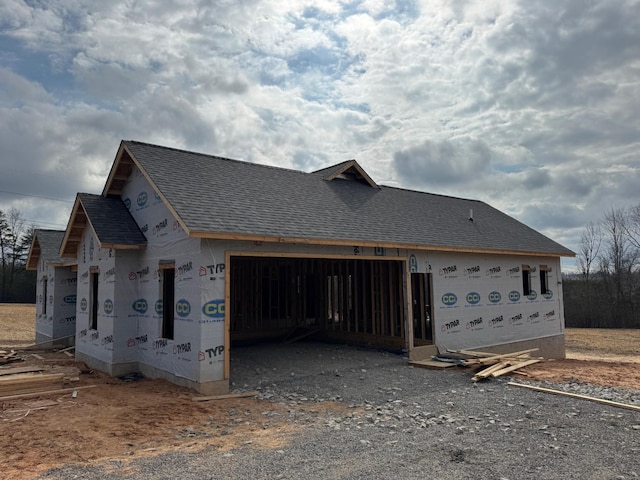 view of property exterior with a garage