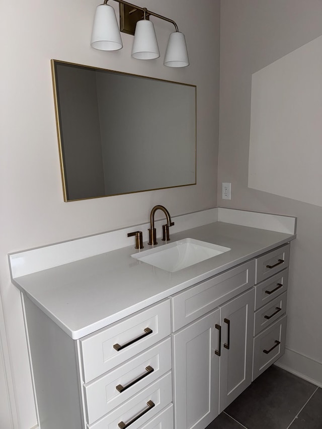 bathroom with vanity and tile patterned floors