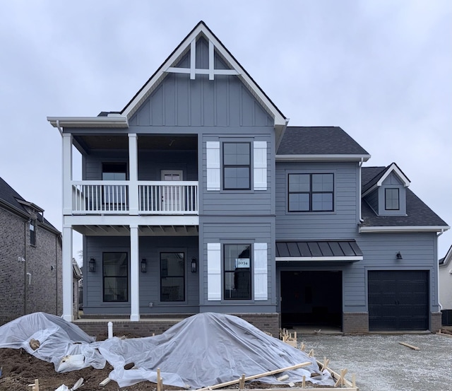 view of front of house with a balcony