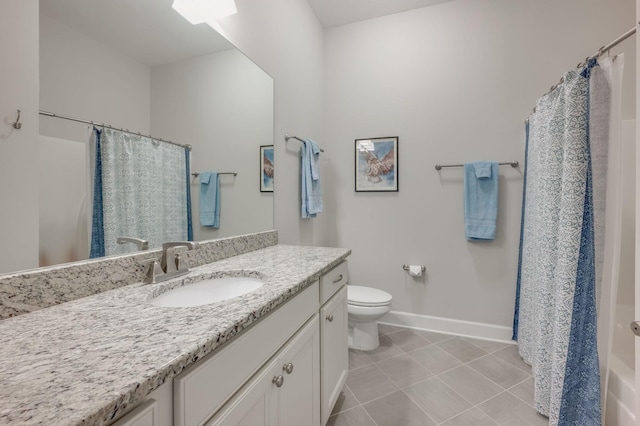 bathroom featuring vanity, tile patterned flooring, a shower with curtain, and toilet