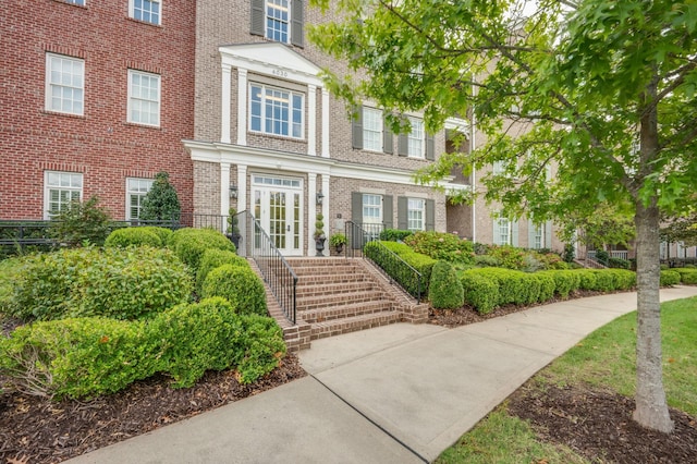 entrance to property featuring french doors