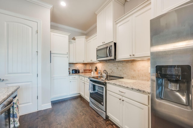 kitchen with backsplash, white cabinets, ornamental molding, light stone counters, and stainless steel appliances