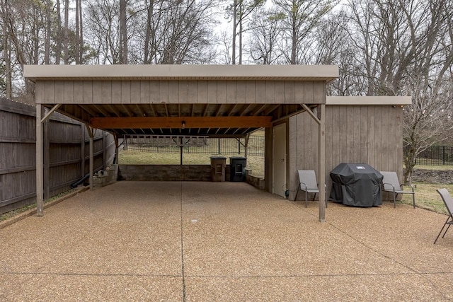 view of parking / parking lot with a carport