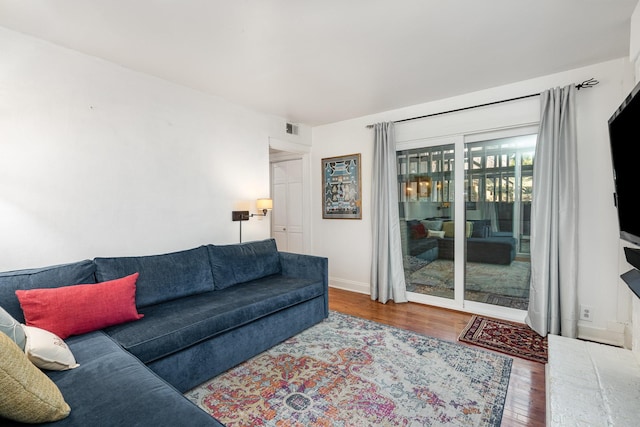 living room with hardwood / wood-style flooring