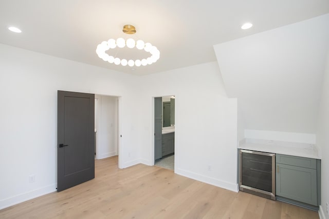 interior space featuring wine cooler and light wood-type flooring