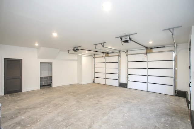 garage featuring a garage door opener