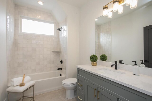 bathroom featuring shower / washtub combination, toilet, vanity, a chandelier, and tile patterned floors