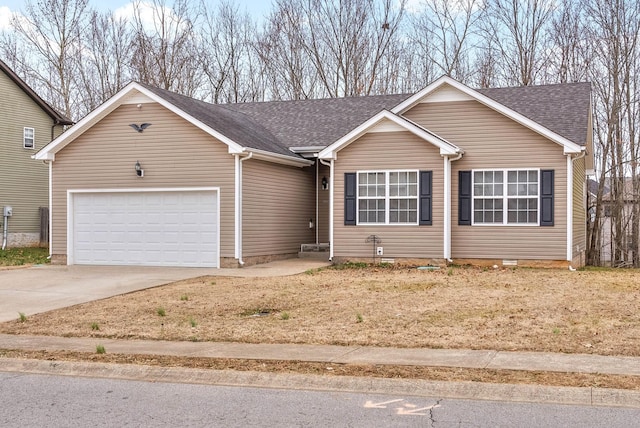 ranch-style home with a garage