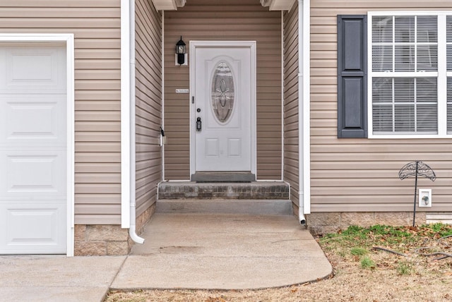 entrance to property with a garage