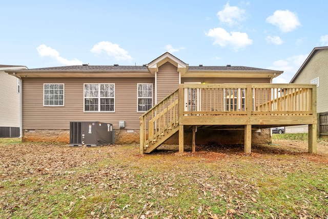 back of house with central AC and a deck