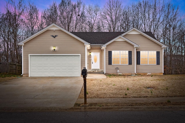 ranch-style home with a garage